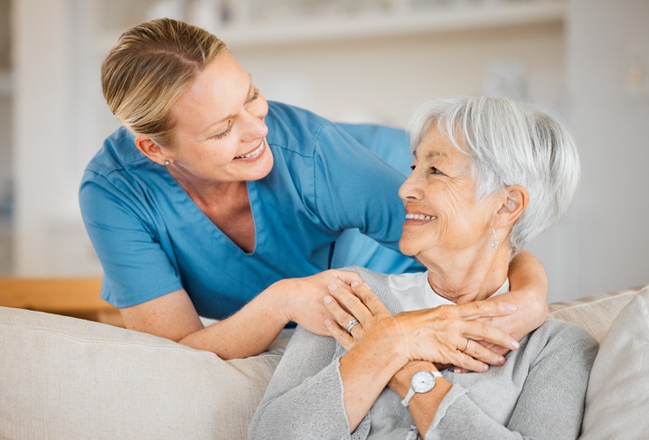 Nurse caring for senior woman in Bossier City’s best long-term care facility