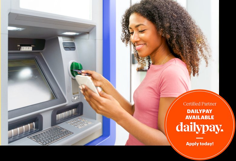 A smiling woman at an ATM highlighting DailyPay available in Bossier City, LA