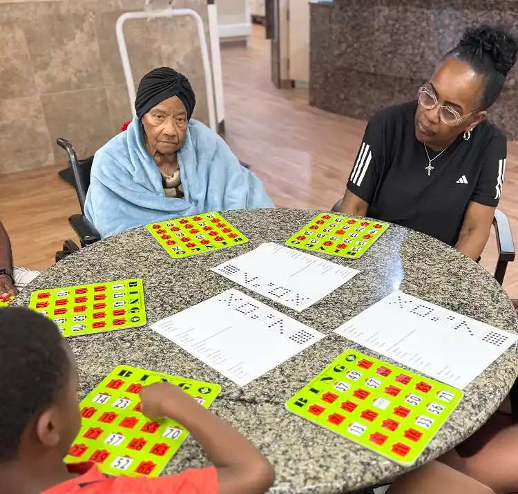 Group of aged people playing bingo at a nursing home in Bossier City, LA