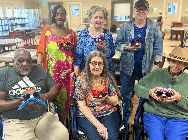 Residents showing their crafts at Colonial Oaks Skilled Nursing in Bossier City, LA